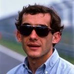 ayrton senna 1991 indossa occhiale da sole persol indossa camicia azzurra button down